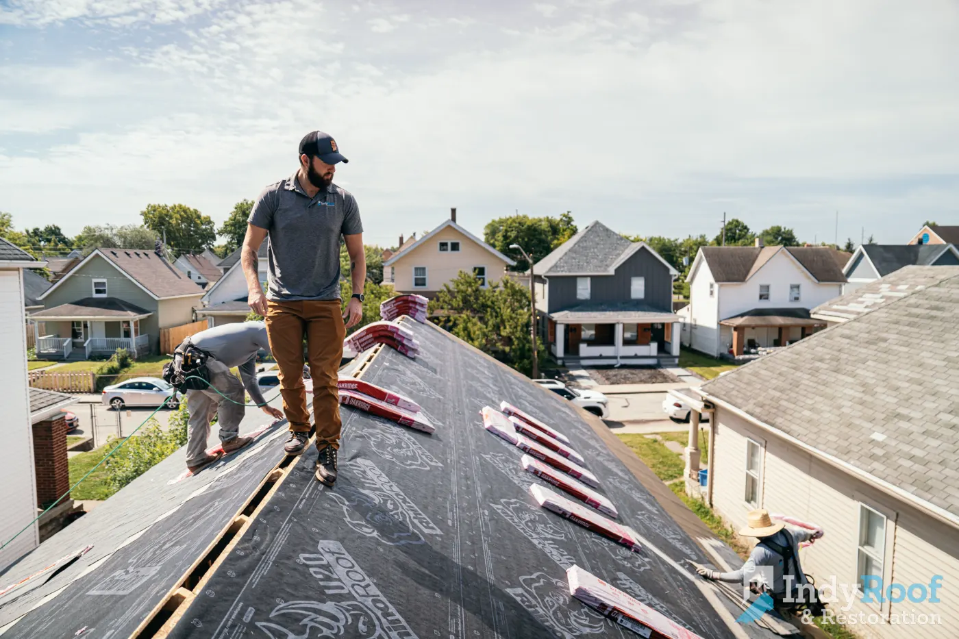 Tarping and dry-in on a Imperial Hills commercial roof